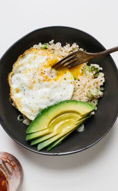 Brown rice—higher in fiber and other nutrients than its white counterpart—is the perfect vehicle for this quick, protein-heavy lunch.
